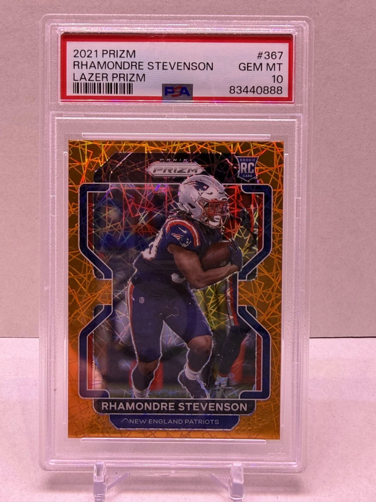 Rhamondre Stevenson — 2021 Panini Prizm RC, Orange Lazer